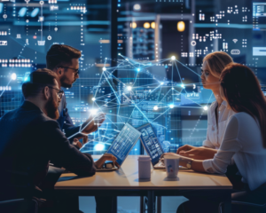 Team of professionals collaborating with laptops in a high-tech office, discussing digital transformation and operational resilience in banking.